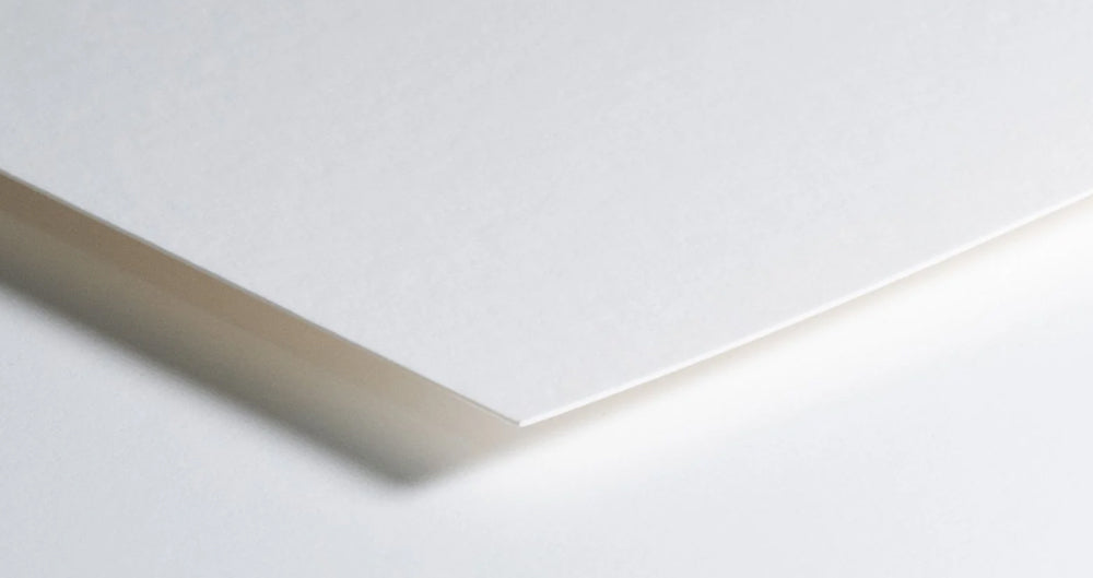 close up photo of matte archival museum quality paper used in the hitorii bouldering project ticklist posters.